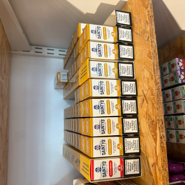 Dainty's Premium Strawberry 12mg and RY4 Tobacco stock photographed at OB Vape